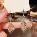 Boucles d'oreilles en forme de feuille de cristal pour femmes brillantes en Zircon fleur