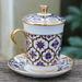 Novica Handmade Blue Celebration Benjarong Porcelain Cup And Saucer