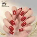 Ongles courts et brillants à paillettes rouges presse sur N64.Set faux ongles N64.Square manucure