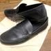 Louis Vuitton Shoes | Black Louis Vuitton Penny Loafers Size 7 1/2. Lightly Worn, Preteen Condition. | Color: Black | Size: 7.5