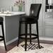 Lark Manor™ Alesja Swivel Counter or Bar Height Armless Bar Stool w/ Footrest in Faux Leather & Wood Wood/Upholstered/Leather in Black | Wayfair