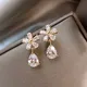 Boucles d'oreilles à tige fleur en biscuits brillant pour femmes boucles d'oreilles goutte d'eau