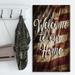 DESIGN ART Designart Welcome to our home. American Flag Textual Entrance Art on Wood Wall Art - Blue 30 in. wide x 40 in. high