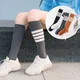 Chaussettes hautes en coton pour femmes bas rayés pour femmes noir blanc décontracté sport