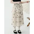 Imakoni-Jupe mi-longue en maille florale pour femme jupe trapèze à volants tempérament haut été