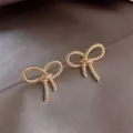 Boucles d'oreilles nœud papillon en métal pour femmes boucles d'oreilles nœud simple accessoires