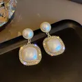 Boucles d'oreilles longues en forme de cœur pour femme imitation de perles luxe élégant coréen