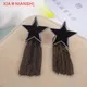 Boucles d'oreilles Vintage en émail noir étoile à cinq points avec pompon en fil de cuivre