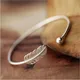 Bracelets ouverts plaqués argent pour femmes bijoux non allergiques plume simple petite boule