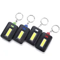 Mini lampe de poche LED Portable porte-clés torche porte-clés lampe d'urgence sac à dos de