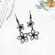 Boucles d'oreilles en forme de grande fleur noire pour femmes longues boucles d'oreilles pendantes