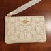 Coach Bags | Coach Wristlet, Chalk Leather W/Perforated Coach C Logo - Nwt! | Color: White | Size: Os