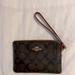 Coach Accessories | Coach Brown Black Canvas Signature Logo Wristlet | Color: Black/Brown | Size: Os