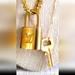 Louis Vuitton Jewelry | Louis Vuitton Luxury Necklace With Key That Locks And Unlocks Padlock! | Color: Gold/Silver | Size: Os