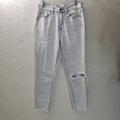 American Eagle Outfitters Jeans | American Eagle Mom Jeans Raw Hem Womens Sz 4 R Distressed Light Wash Denim Pants | Color: Blue/White | Size: 4