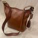 Coach Bags | Coach Legacy Bucket Duffle Tassel 19859 Black Leather Crossbody Handbag | Color: Black | Size: Large
