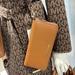 Michael Kors Bags | Michael Kors Large Travel Continental Wristlet Wallet Phoneholder Luggage | Color: Brown/Gold | Size: Large