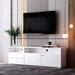 Orren Ellis Chotu TV Stand for TVs up to 75" Wood in White | 20.5 H x 63 W x 11.8 D in | Wayfair 115CAEE40EE34122958066BDDAFEEE54