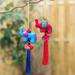 The Holiday Aisle® Festive Tusk Hanging Figurine Ornament Fabric in Red/Blue | 9 H x 3.5 W x 1.4 D in | Wayfair 20F64398CD7D4A3DB48471FFB08302AC