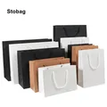 Sac de piste en papier kraft blanc noir emballage cadeau sacs fourre-tout en carton faveurs de