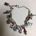 Disney Jewelry | Disney Mickey Mouse & More Charm Bracelet | Color: Silver | Size: Goes From 7-10 Inches