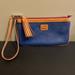 Dooney & Bourke Bags | Dooney & Bourke Large Slim Wristlet With Tassel | Color: Blue | Size: 8”X4.5”