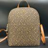 Michael Kors Bags | Holiday Sale Michael Kors Slim Logo Backpack Star Print | Color: Brown/Gold | Size: Refer To Pictures
