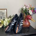 Adidas Shoes | -/ Adidas 11questra Black Cleat Sneaker Shoes | Color: Black/Orange | Size: 12