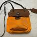 Dooney & Bourke Bags | Dooney And Bourke Nylon Saddle Bag | Color: Orange | Size: Os