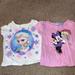 Disney Shirts & Tops | 2 Size 12month Disney Shirts Pink Minnie Mouse And White Elsa From Frozen | Color: Pink/White | Size: 12mb