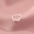 Bague argentée en forme de nœud papillon pour femme belle bague réglable style simple haute