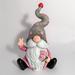 The Holiday Aisle® Magnesium Garden Gnome Holding Flowers w/ Grey Hat "The Valentinos" Metal | 20.87 H x 13.19 W x 9.45 D in | Wayfair