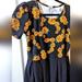 Lularoe Dresses | Lularoe Amelia Gold Floral With Black Skirt | Color: Black/Gold | Size: L