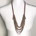 Anthropologie Jewelry | Anthropologie Tan Leather And Gold Statement Necklace | Color: Gold/Tan | Size: Os