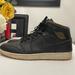 Nike Shoes | Nike Air Jordan 1 Mid Black Gold Leather Running Sneakers Mens Size 12 | Color: Black/Gold | Size: 12