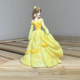 Disney Toys | Disney Beauty And The Beast Belle Princess Figurine 2” Cake Topper Collectible | Color: Yellow | Size: 2”