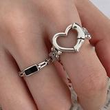 Free People Jewelry | 2 Rings Stackable Silver Heart | Color: Black/Silver | Size: Os