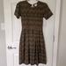 Lularoe Dresses | Black And Gold Lularoe Amelia Dress Nwt | Color: Black/Gold | Size: S