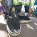 Vans Shoes | Black And White Vans In Women's Size 10 That Slip On. | Color: Black/White | Size: 10