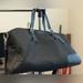 Coach Bags | Coach Travel Duffel & Carry-On Signature Canvas All Black + Small C’s Like New | Color: Black/Silver | Size: Os