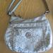 Giani Bernini Bags | Giani Bernini Signature Circle Logo Hobo Crossbody | Color: Silver | Size: Approx. 12"Wx9"Hx3"D