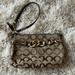 Coach Bags | Brown Coach Wristlet With Gold Chain Detail | Color: Brown/Gold | Size: 8” Long, 5” Tall