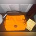 Dooney & Bourke Bags | Dooney & Bourke Bag | Color: Orange | Size: Roughly 9”In Handle 10.5hx15wx5.5d