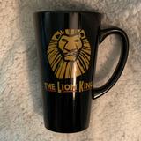 Disney Kitchen | Disney The Lion King New York City Broadway Production Tall Coffee Mug Cup | Color: Black/Yellow | Size: Os