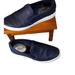 Michael Kors Shoes | Michael Kors Shoes Keaton Black Leather Slip-On Perforated Sneaker | Color: Black/White | Size: 6.5
