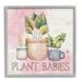 Stupell Industries Plant Babies Potted Sprigs Garden - Floater Frame Graphic Art on Wood in Brown/Green/Pink | 12 H x 12 W x 1.5 D in | Wayfair