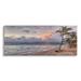 Stupell Industries Tropical Sunset Palm Trees Coast by Kim Curinga - Graphic Art Canvas in Blue/Green | 13 H x 30 W x 1.5 D in | Wayfair