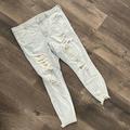 American Eagle Outfitters Jeans | American Eagle Next Level Stretch Light Wash Distressed Denim Jean Jeggings | Color: Blue/White | Size: 20