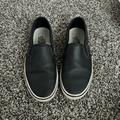 Vans Shoes | Black Vans Sneakers No Laces Pull In Shoes Hood Condition; Used Size 7 Us | Color: Black | Size: 7