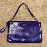 Coach Bags | Coach Purple Perforated Embossed Liquid Gloss Wristlet Wallet Clutch | Color: Purple | Size: Os